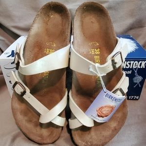 Birkenstock gorgeous pearl color sandals.